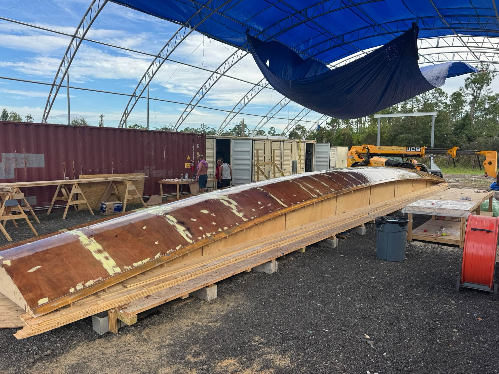 The finished hull mold under the tent at the yard in Southport, Florida